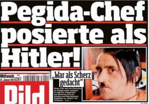 Bachmann, posing as Hitler on his Facebookpage, with the comment 'Er ist wieder da.'